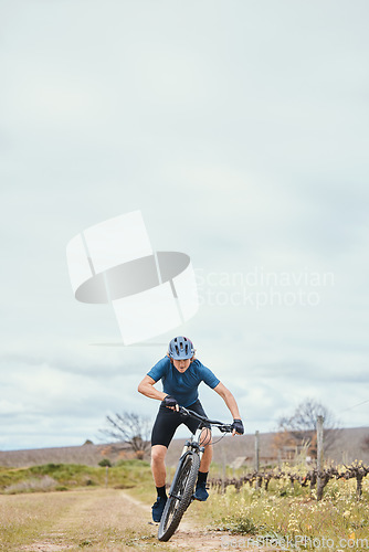 Image of Exercise, man and cycling for fitness, bike and training with wellness, helmet for safety and health. Male person, athlete or cyclist with action, race and adrenaline junkie with adventure and travel