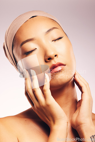 Image of Skincare, dermatology and Asian woman with cosmetics, natural beauty and grooming against a white studio background. Female person, girl and model with treatment, glow and shine with luxury and spa