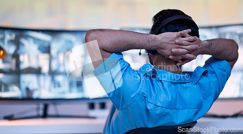 Image of Security guard at desk, relax and cctv monitor for inspection service, building safety consultant and working at night. Screen, video surveillance agency and law officer in control room on late shift