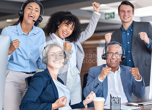 Image of Call center, team or happy people with success of winning telemarketing sales target or achievement. Teamwork, customer service and group of agents cheering in celebration of victory, goals or deal