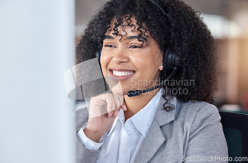 Image of Call center, smile and woman on computer in office for communication, support and contact us for customer service. Reading, telemarketing and sales agent, consultant or African employee with email.