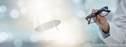 Image of Mockup banner, glasses and hand of an optometrist for vision, healthcare and eye care product. Space, bokeh and a doctor or optician with eyewear recommendation or showing for medical optometry