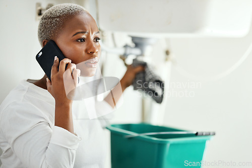 Image of Phone call for plumbing service, woman in bathroom and help from expert contractor to fix leak. Stress, African person on cellphone and problem with pipes in home, professional advice for maintenance