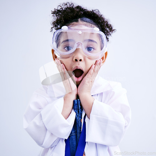 Image of Child, shocked and science portrait with glasses in studio with open mouth, wow or surprised face. African kid student excited for education or biology experiment and learning for future scientist