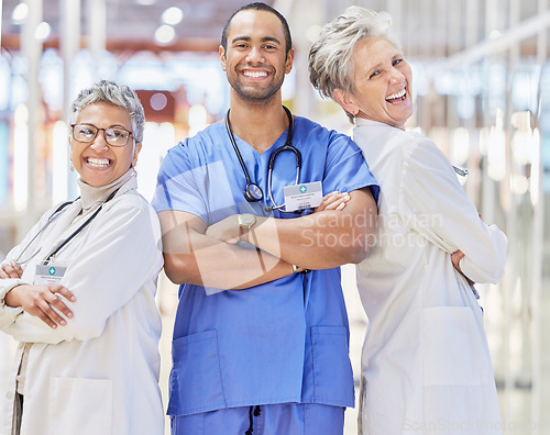 Image of Collaboration, doctor and healthcare with crossed arms in portrait at hospital, smile and laugh for leadership. Medical professional, teamwork and happy group at clinic for service, positive mindset.