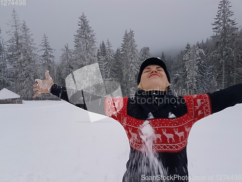 Image of Happy winter time. Well dressed enjoying the winter