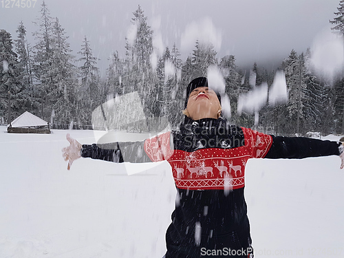 Image of Happy winter time. Well dressed enjoying the winter