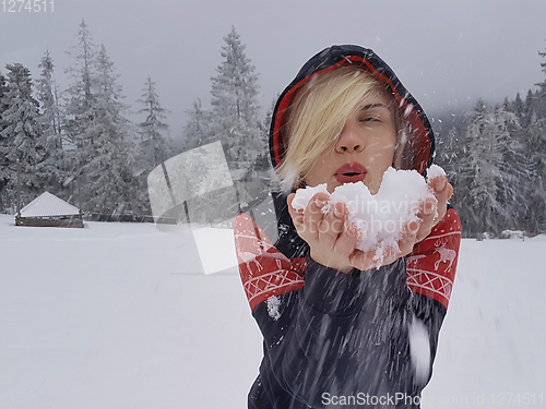 Image of Happy winter time. Well dressed enjoying the winter