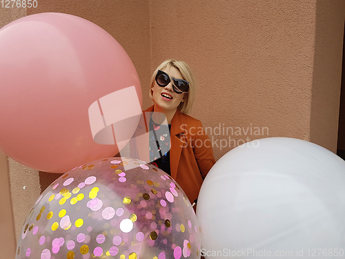 Image of Young fashion happy blonde woman with baloons ,fashion photo, instagram filter