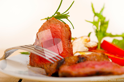 Image of beef filet mignon grilled with vegetables