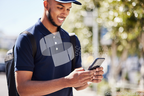 Image of Technology, man with smartphone and in city streets for social media. Online communication or connectivity, texting conversation or happy and male person with cellphone for networking outdoors