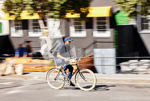 Image of Transportation, delivery on bicycle with package and city street for logistics. Eco friendly transport or distribution service, bike courier and male person with parcel for customer service in road