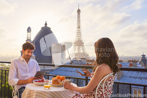 Image of Travel, breakfast and couple in Paris with the Eiffel Tower on a terrace for romance or anniversary. City, vacation or tourism tech app with a man and woman eating food while looking at a view