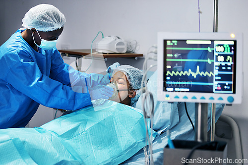 Image of Healthcare, doctor and patient in mask for oxygen in surgery, emergency care and hospital bed. Breathing, monitor and air, surgeon helping person in operation, digital graphs to check medical results