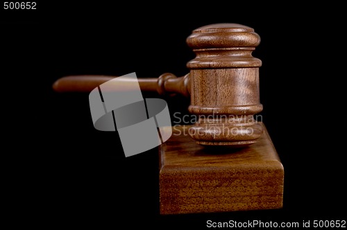 Image of gavel on black