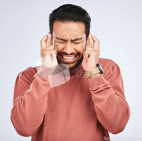 Image of Fingers crossed, hope and man with anxiety for luck, waiting for announcement and bonus on studio white background. Nervous asian male person wish for belief, emoji and trust of winning lottery prize