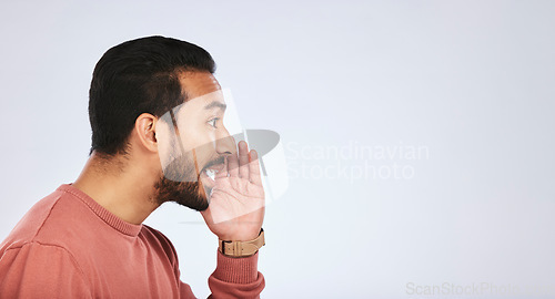 Image of Hand, secret and asian man in studio with whisper sign for announcement, promo or news on grey background. Confidential, gossip and male with drama, rumor or coming soon, emoji and did you know sale