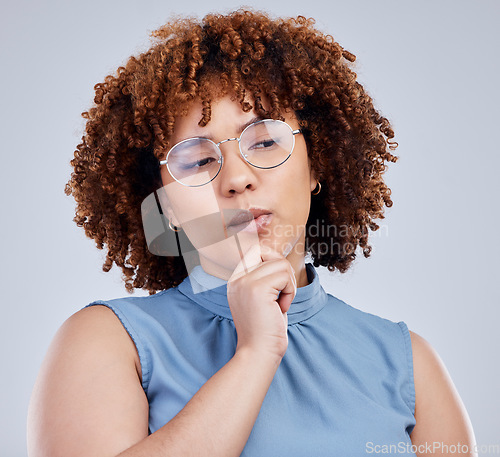 Image of Woman with ideas, thinking and isolated in studio, creative mindset for young model with afro and glasses. Problem solving, brainstorming and focus, African girl with hand on face on white background
