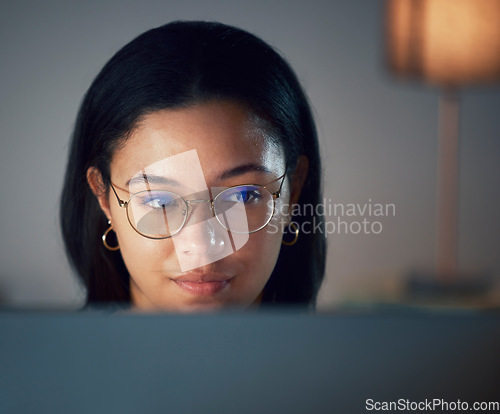 Image of Glasses, focus and woman journalist writing on a computer, online and social media news update or a serious blog. Face, internet and remote work for an employee working on a project or proposal