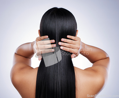 Image of Woman, hair and beauty, back and shine, hairstyle with cosmetics and hands on white background. Female model, keratin and haircare, Brazilian salon treatment and growth with texture in studio