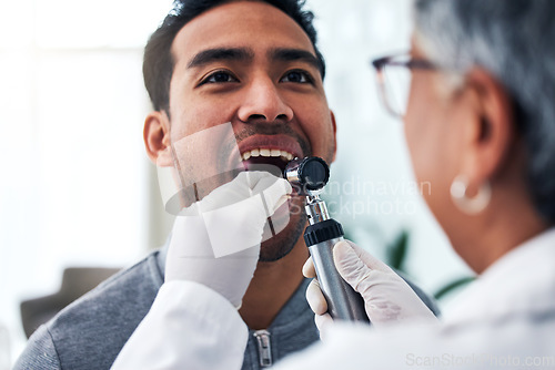 Image of Medical, check and doctor with person and throat in hospital for cancer, sick and surgery. Medicine, healthcare and consulting with woman and patient in clinic for wellness, virus and oral exam