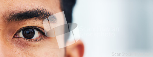 Image of Half portrait, closeup and eyes of man with mockup for vision, focus and healthcare with test for contact lenses. Zoom, eye exam banner and model looking at healthy lens care and wellness on space