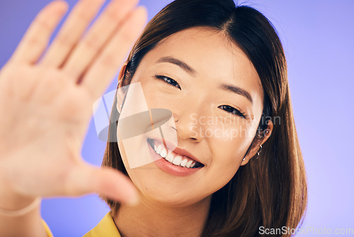 Image of High five, hand and portrait of woman with support, care or gesture for motivation, success and happiness in studio. Hands, palm and face of Asian model with smile, greeting or positive person