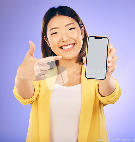 Image of Phone screen, portrait and woman with mockup presentation, marketing and social media information. Happy asian person with mobile space for contact and ui or ux design on studio, purple background