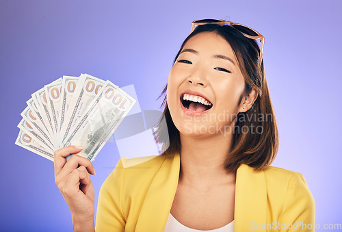 Image of Money fan, portrait and woman or winner with bonus, financial success and winning, college loan or lottery. Happy asian person or student with scholarship cash or funding on studio, purple background