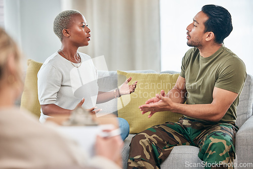 Image of Couple on a couch, therapy and anger with divorce, screaming and relationship issue with psychologist. Counseling, Asian man or black woman on a sofa, interracial and shouting with anxiety and stress