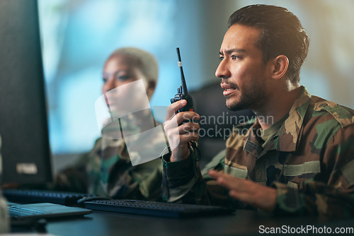 Image of Walkie talkie, communication and military team at the station with computer giving directions. Technology, collaboration and soldiers in army room or subdivision with radio devices for war contact.