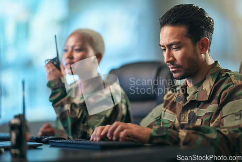 Image of Walkie talkie, working and army team at the station with computer giving directions. Technology, collaboration and soldiers in military room or subdivision with radio devices for war communication.