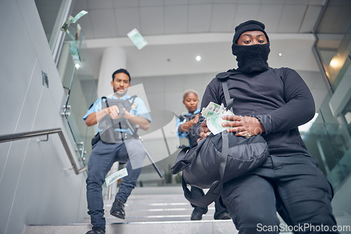 Image of Robbery, bank and police running after criminal for justice, punishment and safety, serious and danger. Crime, corruption and man robber with stolen money chase for security, law or financial loss