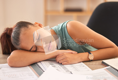 Image of Sleeping, documents and finance with a business woman exhausted in her office while working on an audit. Tired, paper and accounting with a female employee asleep at her desk at professional work