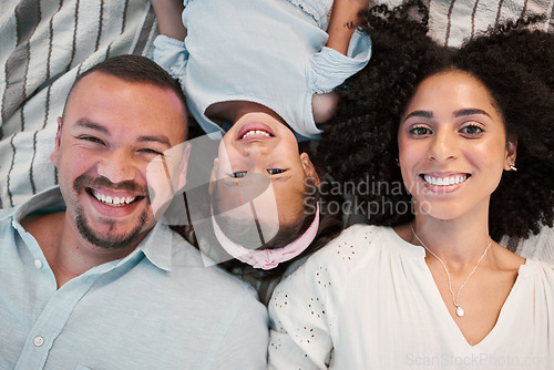 Image of Top view, family and parents with girl, portrait and love with bonding, quality time and support. Face, mother or father with daughter, female child or kid with happiness, cheerful or loving together