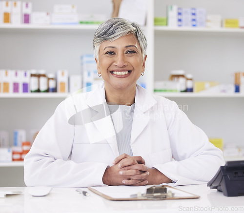 Image of Pharmacy, happy and portrait of consulting woman for medicine, service or emergency healthcare. Smile, doctor and a mature female pharmacist in a career as a pills distribution consultant at a clinic