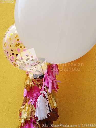 Image of Young fashion happy blonde woman with baloons ,fashion photo, instagram filter