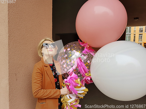 Image of Young fashion happy blonde woman with baloons ,fashion photo, instagram filter