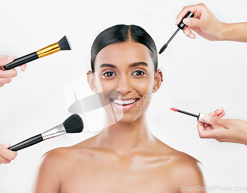 Image of Portrait, beauty and woman with makeup, brushes or organic facial on a white studio background. Face, female person or model with cosmetics tool, self care or wellness with natural skincare or luxury