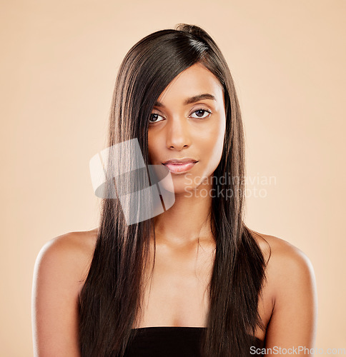 Image of Woman, portrait and hair care in beauty salon, cosmetics or skincare against a studio background. Female person or model posing in relax or satisfaction for keratin, spa and treatment on mockup space