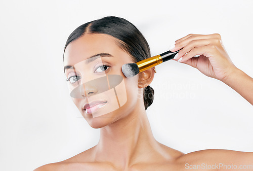 Image of Portrait, beauty and woman with makeup, brush and skincare against a white studio background. Face, female person or model with cosmetics tool, wellness and luxury with organic facial and dermatology