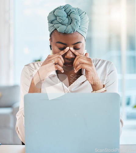 Image of Business, burnout and black woman with a headache, pain and employee overworked, anxiety and fatigue. Female person, depression or consultant with a migraine, laptop and tired with stress and anxiety