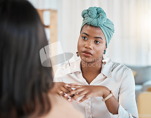 Image of Business people, conversation and meeting or interview in office with a black woman as leader. Face of African female entrepreneur with employee to listen to advice, idea or communication at work