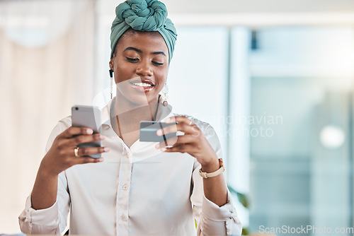 Image of Work, online shopping and a black woman with a credit card and phone for ecommerce or banking. Happy, finance and an African girl or employee making a payment on a mobile app from the office