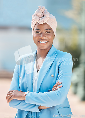 Image of Corporate pride, portrait and a black woman with arms crossed for city business or work. Smile, professional and an African employee or girl with confidence and happiness about professional career