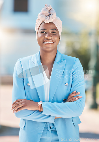 Image of City pride, portrait and a black woman with arms crossed for business or corporate work. Smile, professional and an African employee or girl with confidence and happiness about professional career