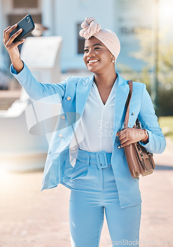 Image of Black business woman, selfie and smile in street with fashion, beauty and post for social network app. Happy African entrepreneur, photography and profile picture for web blog with suit in metro cbd
