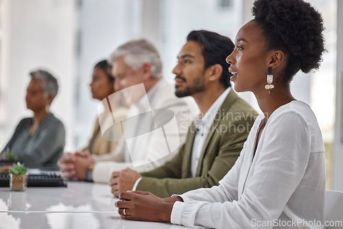 Image of Diversity, corporate and black woman in a meeting or business conference for company development or growth. Listening, workshop and group or row of employees in training presentation for teamwork