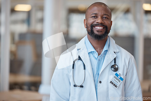 Image of Doctor, portrait and smile with black man at hospital or lab coat with confidence or leader. Healthcare professional, happy and face with manager or positive mindset at clinic with vision or expert.