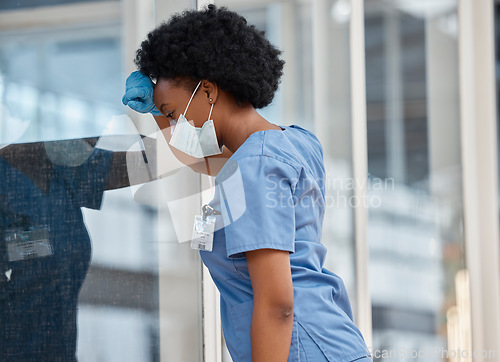 Image of Surgeon, mental health problem and black woman sad after surgery fail, hospital error or clinic crisis. Depression, burnout and African female doctor tired after medical mistake, stress or healthcare
